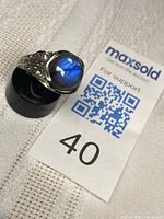 Ring top view showing labradorite flash and silver work