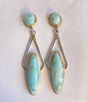 Front view of both earrings showing stud and drop stones