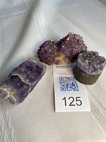 All three amethyst pieces with lot tag visible