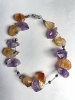 Full view of bracelet showing crystal arrangement and silver beads