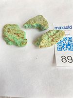 Three green chrysoprase stones with Maxsold card