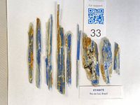 All kyanite pieces laid out with label showing origin and weight