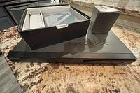 Top view showing DVR, speaker, boxed router