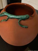 Top view showing glazed interior and applied lizard figure