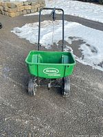 Full view of Scotts SpeedyGreen 1000 spreader showing hopper, wheels and handle