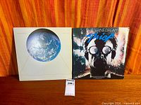 Both Tangerine Dream albums front covers with lot tag visible