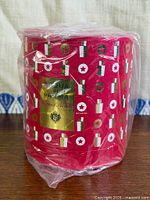 Front view of sealed Acqua di Parma Peonia Nobile cylindrical gift box