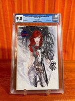 Front view of CGC slab showing cover art and 9.8 grade label