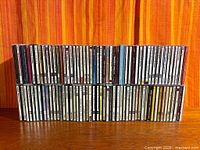 Full front view of two rows showing entire CD collection