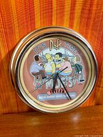 Front view showing full face of Simpsons Duff Beer Moe's Tavern clock