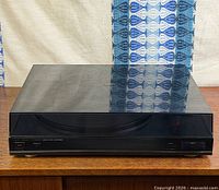 Front view with dust cover closed showing whole turntable