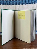 Inside cover showing label stating thematic collection and approximate stamp count