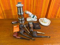 Group shot of all smoking collectibles on table