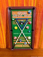 Full view of rectangular Super Eight Ball sign showing all elements