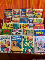 Front view of rack containing all bagged vintage comics