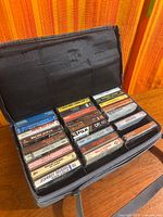 Open case displaying two rows of cassette tapes