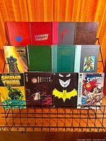 Full lot on wire rack showing two rows of DC books