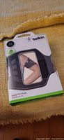 Front of sealed Belkin Ease-Fit Plus armband package