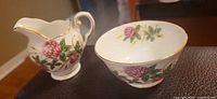 Creamer and bowl together showing size and matching pattern