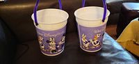 Both Walt Disney World plastic popcorn buckets front view