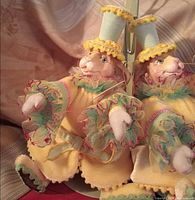 Pair of jester rabbit figurines in full costumes