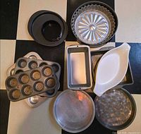 Top view of entire bakeware assortment on tiled floor