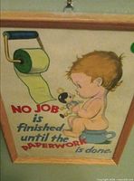 Full view of framed print showing baby on potty, caption visible