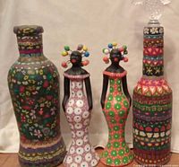 Front view of all four hand-painted items