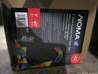 Close-up of product label detailing size, features and brand