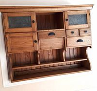 Full view of ash hutch top showing doors, drawers, shelves