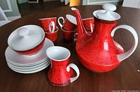 Full espresso set displayed on table