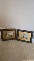 Both framed prints standing side by side showing overall appearance