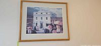 Framed print of Canadian Bank of Commerce street scene on wall