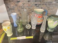 Group shot of all nine vases on stovetop