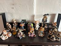All 13 resin figurines displayed on shelf