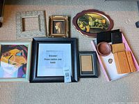 Group shot showing all frames, plaque, ashtray, wallets and wood blocks
