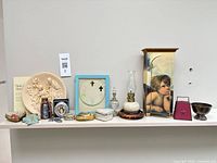 Full view of all decorative items on shelf