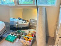 Mirror, rug, lamps, bin with contents