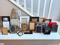 Group shot of all frames and stands on table