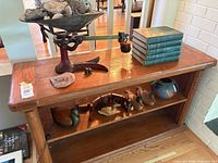 Console table with all decorative items displayed