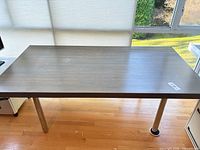 Top view of gray stained wood table surface