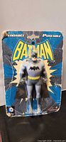 Front of sealed Batman bendable poseable figure on blister card