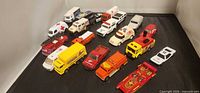 Group shot of all 20 die-cast vehicles arranged in rows