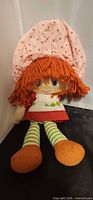 Front view of Strawberry Shortcake rag doll