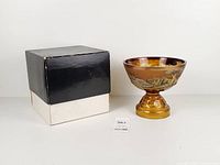 Entire bowl with packaging box for scale