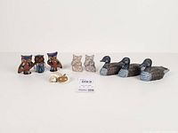 Group shot showing all owl, duck and dog figurines