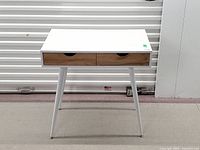 Front view of desk with drawers closed