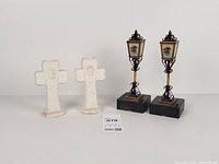 Full group—two ceramic crosses and two miniature Balato street lamps on bases