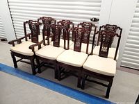 All eight Chinese-style chairs grouped together