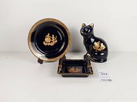 Group shot of Limoges Castel plate, ashtray and cat figurine